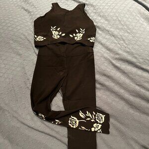 Athleta cropped bra top and leggings with cut outs and a floral print
